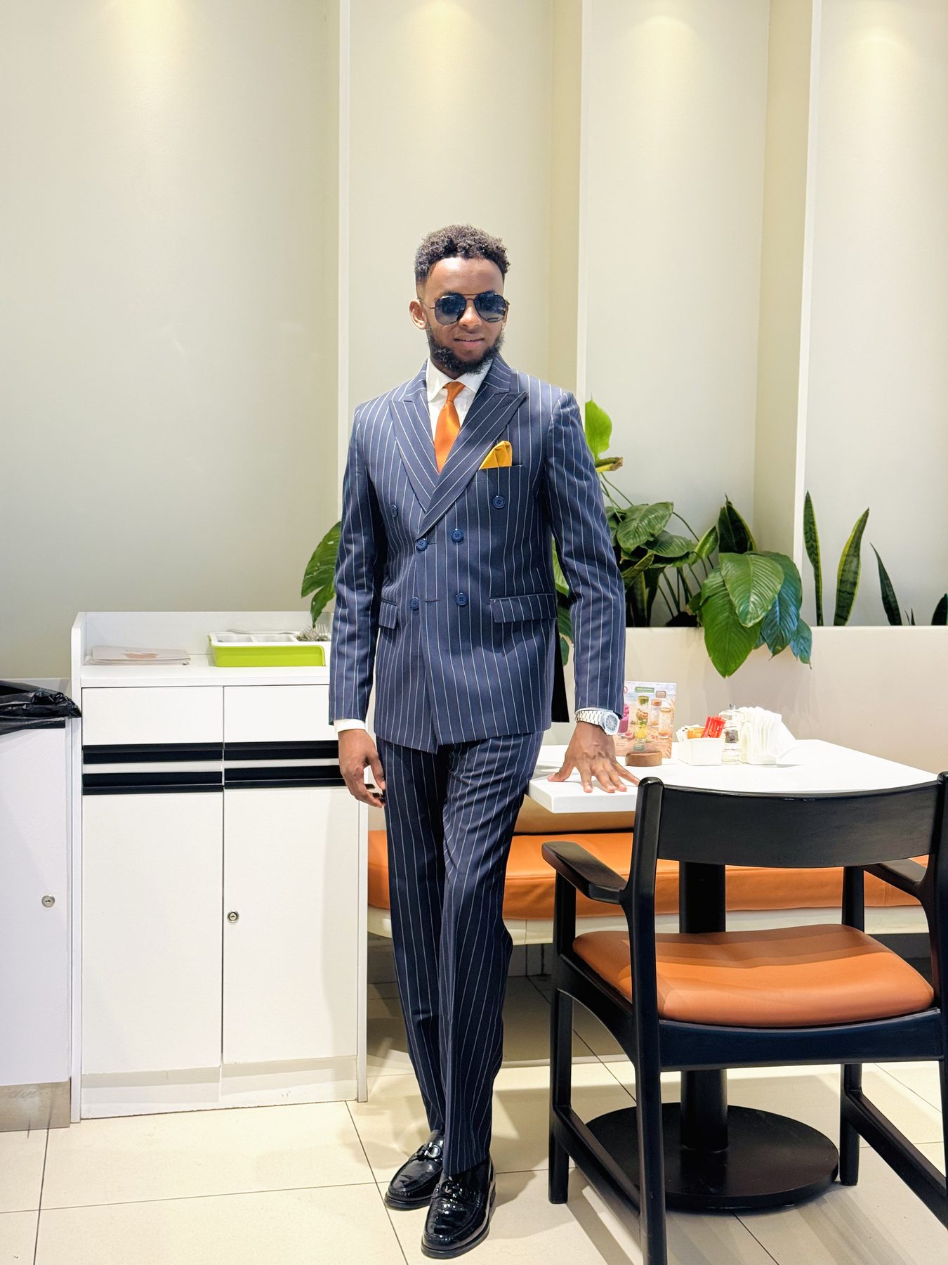 Navy pinstripe double-breasted suit by Kiin Clothline